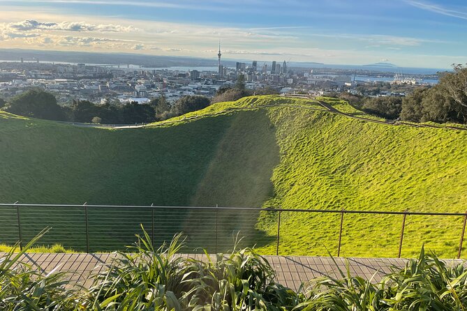 Auckland Highlight Attractions Small Group Tour - Mission Bay: finish with sand, sea air, and laid-back energy