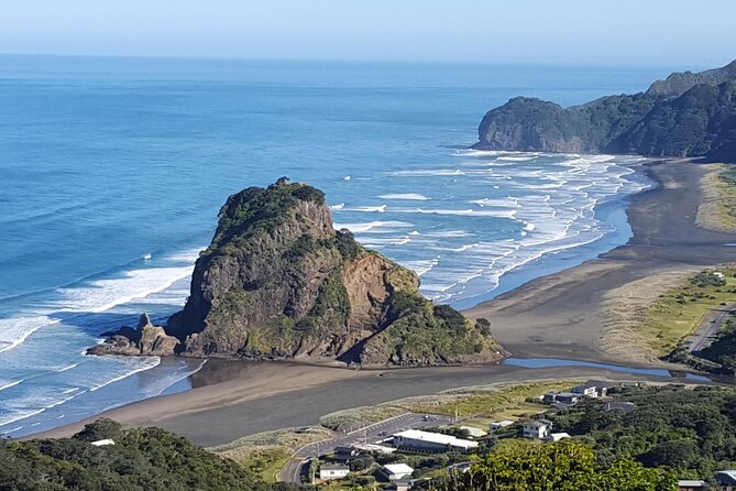 Explore BLACK SAND PIHA BEACH, and Water Falls in West Auckland - Piha Beach and Lion Rock: black sand, big surf energy