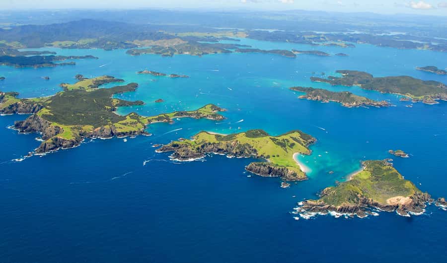 From Auckland: Full-Day Tour to the Bay of Islands - Hole in the Rock: Motukokako Island’s Signature Passage