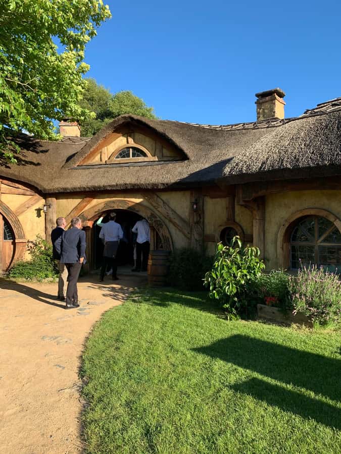 From Auckland: Hobbiton & Hamilton Gardens Small Group Tour - Sheep Farm Views and Movie Stories at Alexander Family Sheep Farm