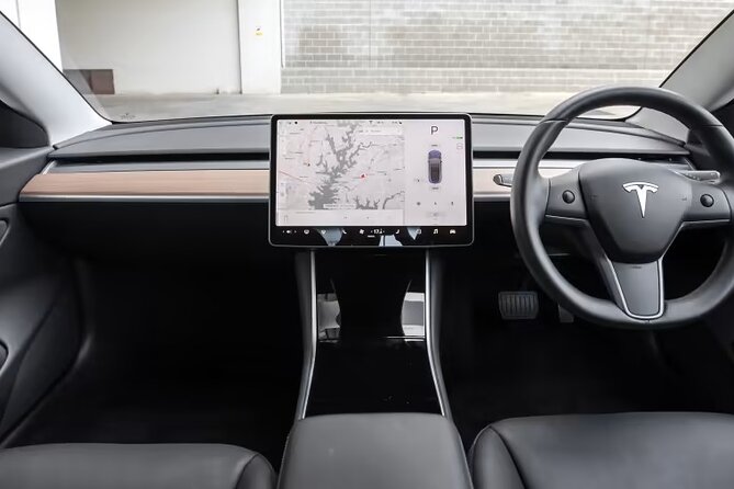 Full-Day Driver with Tesla Car-Customisable North Island Tour - Maori Village, Agrodome Farm Show, and ZORB Rotorua: Culture and Adrenaline in One Bubble