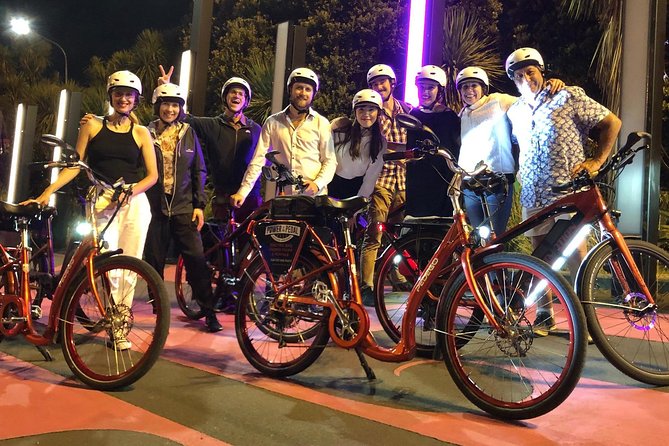 The City Lights: a unique electric bike tour of Auckland by night! - Grafton Gully and the return ride: bridges and port lights in the background
