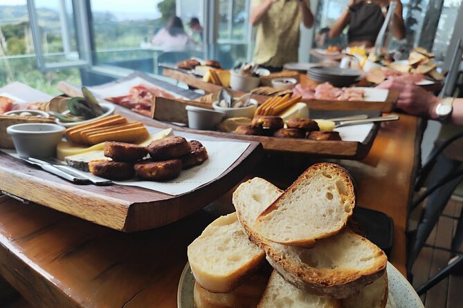 Waiheke Island: Scenic Wine Tour on a Double Decker Bus - Oneroa free time: shops, cafes, and waterfront strolling